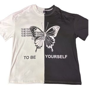 Half white/half black men’s sz Large tee shirt.